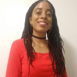 girl with black braids wears red shirt and black choker