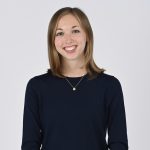 Whitney Sandford in front of a white background