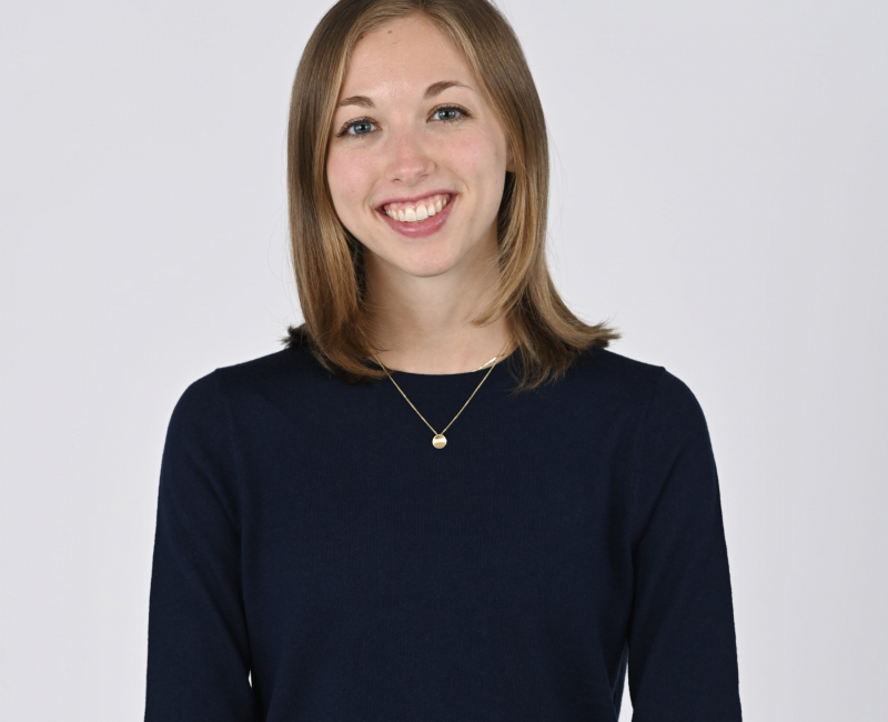 Whitney Sandford in front of a white background